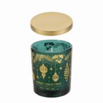 candela in barattolo vetro verde